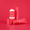A collection of Wella Professionals Invigo Color Brilliance hair products arranged on a red background. Anteprima dell’immagine prodotto