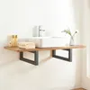 A wall-mounted console with a sink and faucet, along with toiletries and towels. Anteprima dell’immagine prodotto