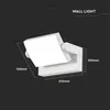 A 3D render of a white wall light with dimensions indicated. Náhled obrázku produktu