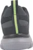 The back view of a gray sneaker with a green stripe on the heel tab. Anteprima dell’immagine prodotto