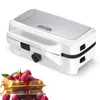A white and silver sandwich maker/waffle iron with a stack of waffles and raspberries in the foreground. Produktbild-Vorschau