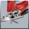 A close-up view of the base of a red and silver jigsaw. Produktbild-Vorschau