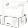 A vacuum storage bag filled with white bedding, sitting inside a white fabric storage box with gray trim. Anteprima dell’immagine prodotto