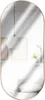 A reflection in an oval mirror shows a room with a pendant light, framed pictures, and a plant. Produktbild-Vorschau