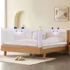 A bed with a safety rail installed, showing a child-friendly design. Produktbild-Vorschau