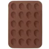 A brown silicone mold for baking nuts in the shape of strawberries. Anteprima dell’immagine prodotto