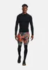 A man is standing and posing in athletic wear against a white background. Produktbild-Vorschau