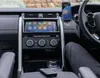 Interior of a car with a phone mounted on the dashboard, displaying Apple CarPlay. Náhľad obrázku produktu