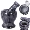 A collage of a granite mortar and pestle set, showing different angles and one with peppercorns. Voir les images du produit