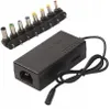 A black universal laptop power adapter with a set of interchangeable connector tips. Produktbild-Vorschau