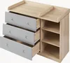 A changing table dresser with drawers and shelves. Produktbild-Vorschau