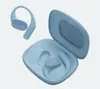 A pair of light blue JBL wireless earbuds and their open charging case. Produktbild-Vorschau