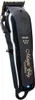 A professional studio shot of a black Wahl Magic Clip cordless hair clipper against a white background. Náhled obrázku produktu