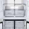 Interior view of a refrigerator, showing shelves and drawers. Produktbild-Vorschau
