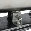 A close-up view of the metal bracket and bolt assembly of a sausage stuffer. Náhled obrázku produktu