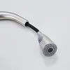 A close-up shot of a kitchen faucet's pull-out spray head and hose. Náhľad obrázku produktu