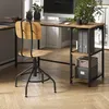 A corner desk with a chair and office supplies in a room. Anteprima dell’immagine prodotto