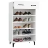 A white shoe cabinet filled with various shoes and slippers on its shelves. Anteprima dell’immagine prodotto