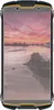 A rugged smartphone with a sunset beach wallpaper displayed on its screen. Náhled obrázku produktu
