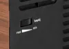 A close-up view of a temperature adjustment dial and indicator on a black electronic device, with a wood-grain textured side panel visible on the left. Náhled obrázku produktu