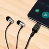 A smartphone connected to a DAC audio adapter and earphones, with a music player interface visible on the phone screen. Produktbild-Vorschau