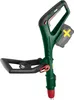 A close-up view of the handle and battery compartment of a cordless grass trimmer. Produktbild-Vorschau
