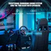 A gaming chair and steering wheel setup with visual effects indicating sound. Produktbild-Vorschau