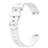 A white silicone watch strap is shown against a white background. Voir les images du produit
