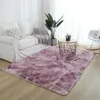 A living room scene with a sofa, rug, and coffee table. Náhľad obrázku produktu