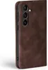 A close-up side view of a brown leather flip case for a smartphone, showing the camera cutout. Produktbild-Vorschau