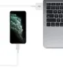 A smartphone is connected to a laptop via a USB-C cable. Produktbild-Vorschau