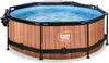 An octagonal above-ground swimming pool with a wood-effect exterior and a blue water-filled interior, covered by a transparent tarp. A filter pump is attached to the side. Náhled obrázku produktu