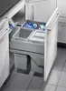 A built-in kitchen waste bin system with multiple compartments, pulled out from under a countertop. Produktbild-Vorschau