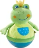A plush toy frog wearing a crown and a shirt with a pocket. Produktbild-Vorschau