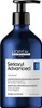 A blue bottle of L'Oréal Professionnel Serioxyl Advanced shampoo with a black pump dispenser. Produktbild-Vorschau