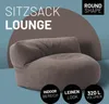 A brown beanbag chair is shown in a studio setting with text overlays. Náhľad obrázku produktu