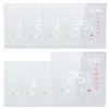 A collage of smart thermostat units, some showing digital displays and icons. Produktbild-Vorschau