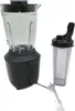 A black blender base with a clear glass jar attached, and a separate clear plastic cup with a black lid, are displayed against a white background. The blender's power cord is visible. Anteprima dell’immagine prodotto