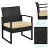 A black rattan armchair with a beige cushion, shown with close-up details of its backrest and support structure. Podgląd zdjęcia produktu