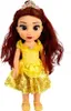 A doll standing against a white background. Anteprima dell’immagine prodotto