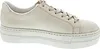 A side view of a beige sneaker with a white platform sole. Náhled obrázku produktu