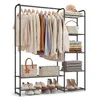 A freestanding metal garment rack with shelves, filled with clothes, bags, shoes, and folded towels. Produktbild-Vorschau