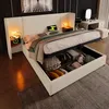 A bedroom scene featuring a bed with storage, a desk, and a lamp. Anteprima dell’immagine prodotto