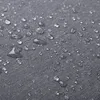 A close-up view of a gray fabric surface with many water droplets on it. Produktbild-Vorschau