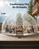 A group of people are sitting inside a large, clear geodesic dome on a wooden deck, with mountains and trees in the background. Anteprima dell’immagine prodotto