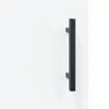 A black handle is mounted on a white surface. Produktbild-Vorschau