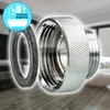 A close-up of a metal adapter and a rubber gasket, with a blurred background of a bathroom. Produktbild-Vorschau
