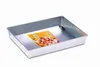 A rectangular baking pan with a textured bottom is shown on a white background. A colorful label with an image of baked goods is placed inside the pan. Náhled obrázku produktu