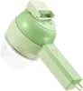 A green and light green electric vegetable cutter with a clear container. Náhled obrázku produktu