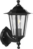 A black outdoor wall lamp with a clear glass enclosure and a visible light bulb. Anteprima dell’immagine prodotto